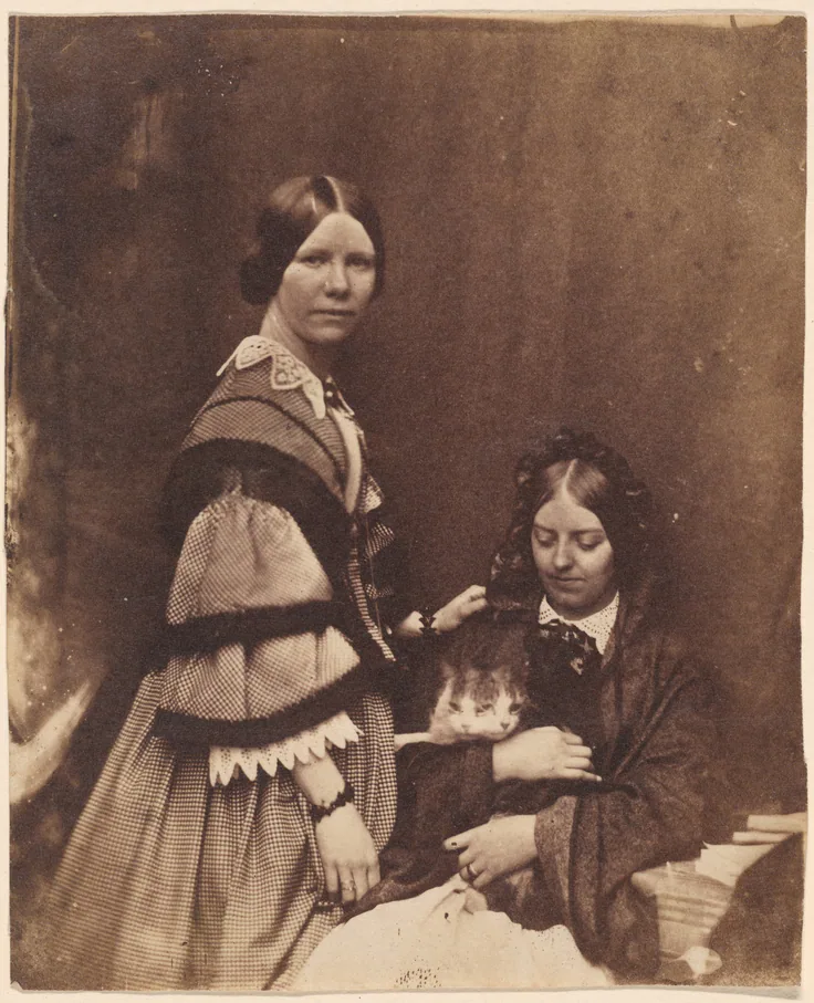 Mrs. Craik Holding Cat: salted paper print by Attributed to Benjamin Mulock, c. 1858.