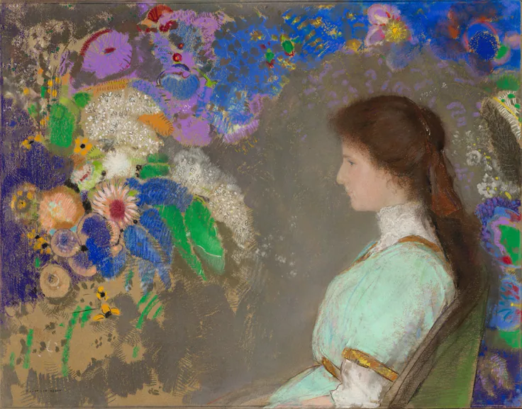 A girl in pale green sits in profile beside an explosion of jewel-colored flowers on a grey ground; soft pastel.