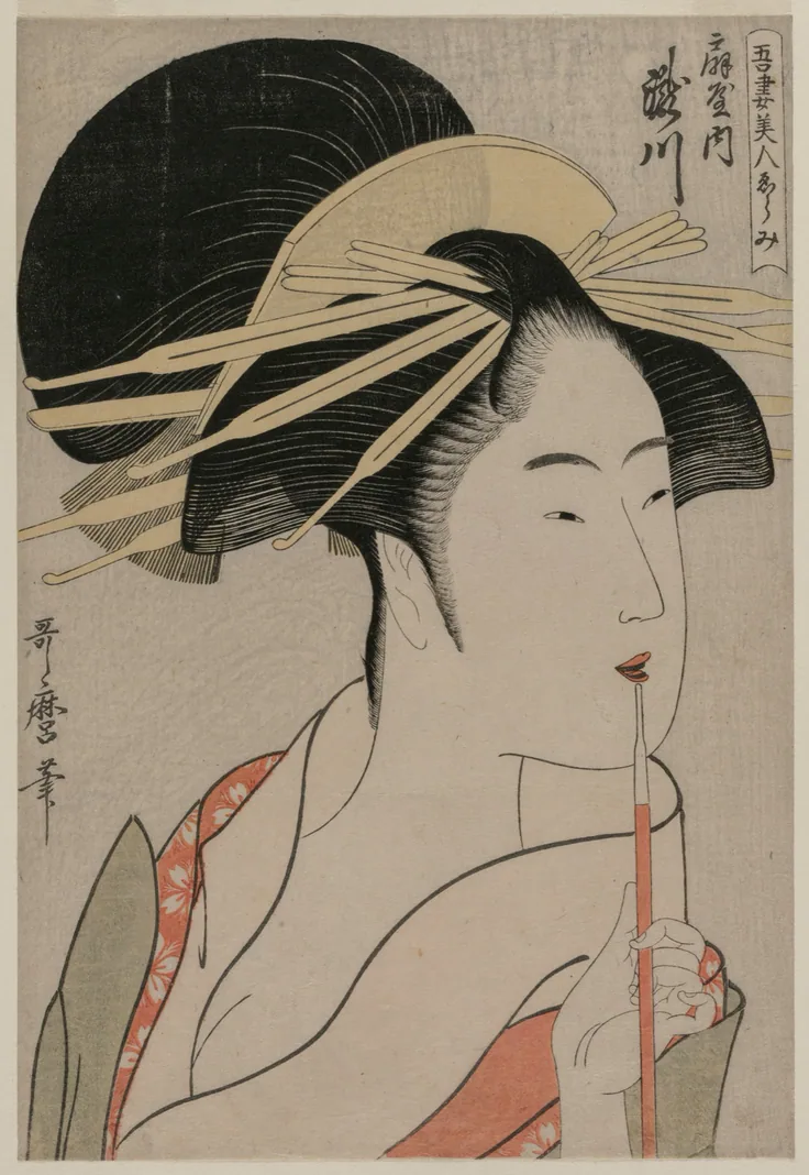A courtesan with an elaborate hairstyle and hairpins holds a red-tipped brush to her lips; cream ground, title text at upper right.