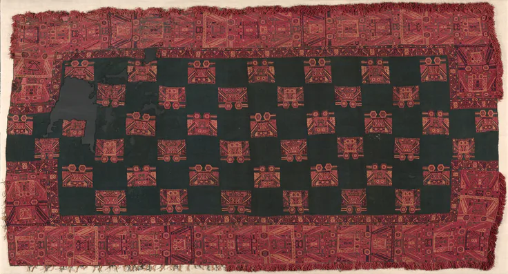 Mantle: camelid fiber: plain weave with embroidery, c. 300 BCE–200 CE.
