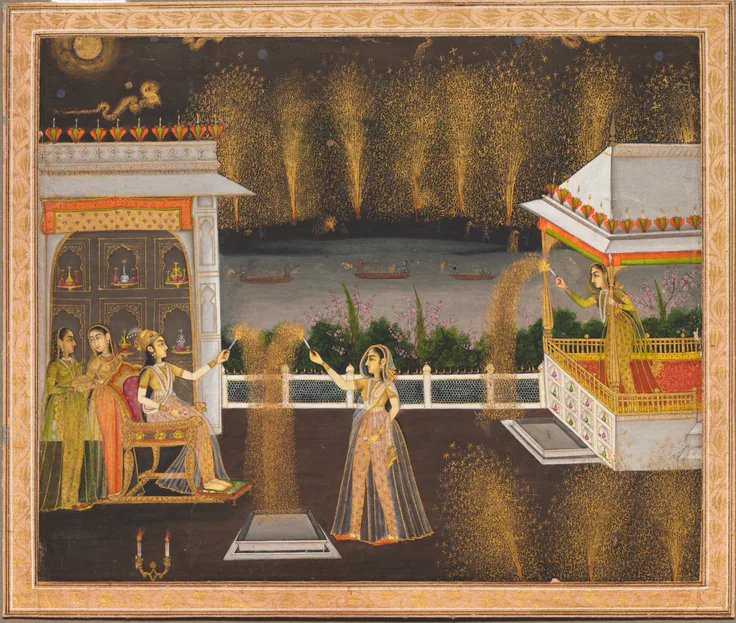 Women on a palace terrace light fireworks; showers of golden sparks rise against a dark night sky over a river.