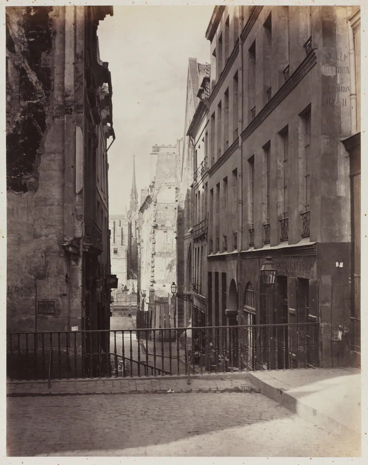 Rue Jean-de-Beauvais. Vue prise de la rue des Écoles vers la boulevard Saint-Germain, en travaux: albumen print from wet collodion negative by Charles Marville, 1865–69.