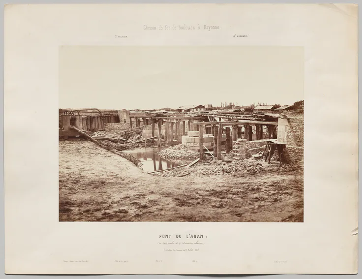 Chemin de fer de Toulouse à Bayonne. Pont de l'Aran (en trois arches de 17m d'ouverture chacune). Situation des travaux au 21 juillet 1861: albumen print from collodion negative by Édouard Baldus, 1861.