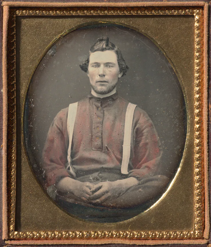 Workman in Red Flannel Shirt and Suspenders: daguerreotype with hand-applied color, c. 1855–60.