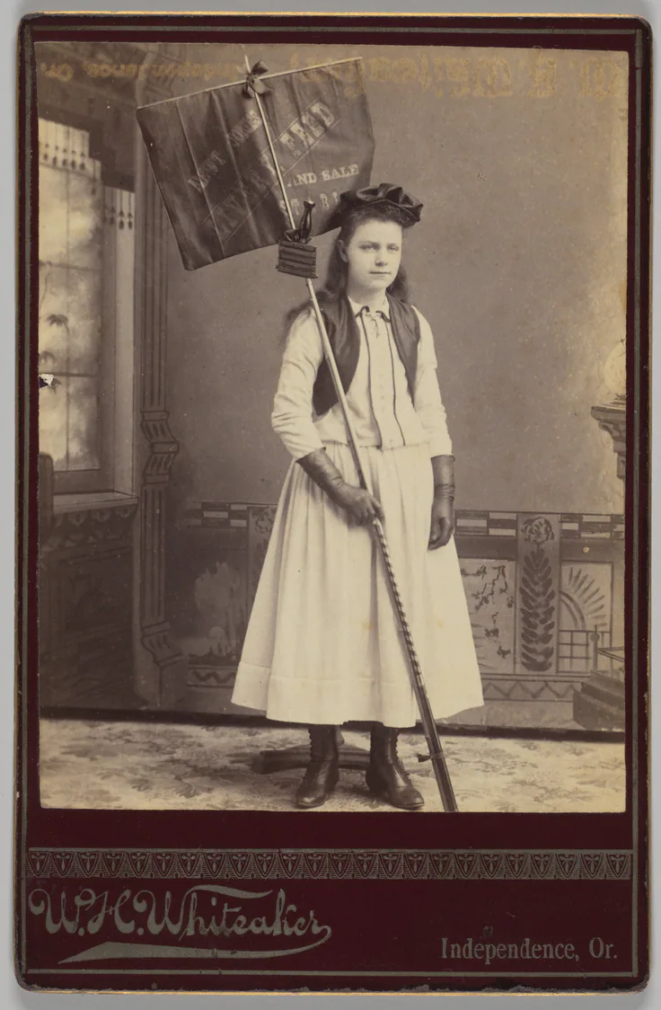[Merchants' Carnival Portrait: Newt Jones Livery Feed Stable, Independence, Oregon]: albumen silver print by William H. Whiteaker, 1880s–1890s.